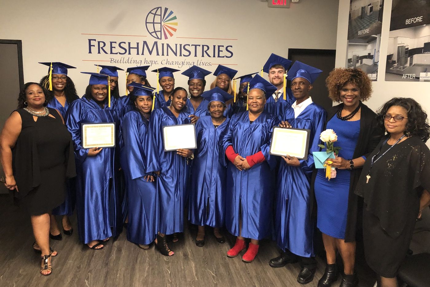 FreshMinistries graduates and staff together with their certificates beneath the FreshMinistries logo.