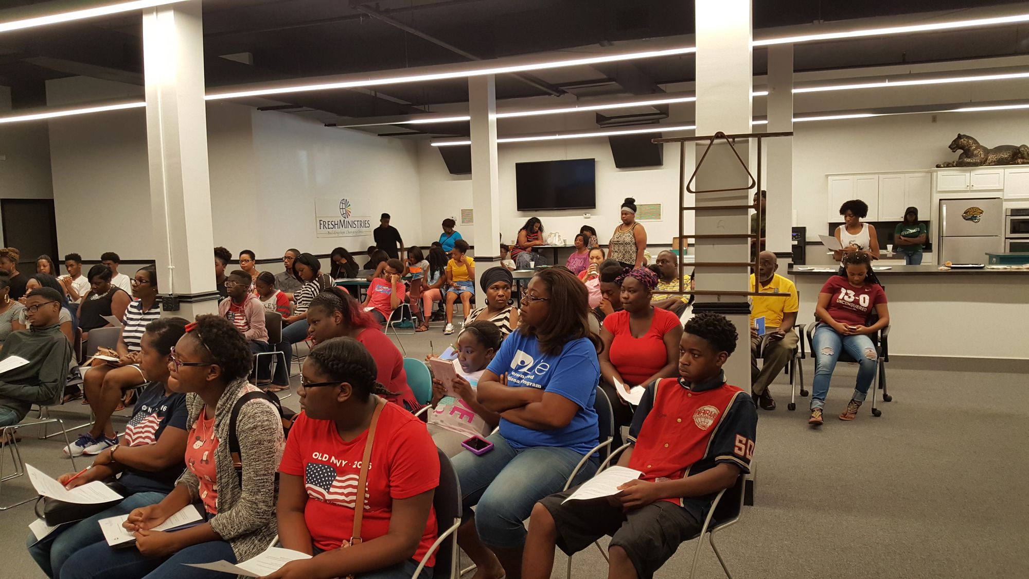 FreshFamilies parents and children gathered at the Weaver Center for Community Outreach