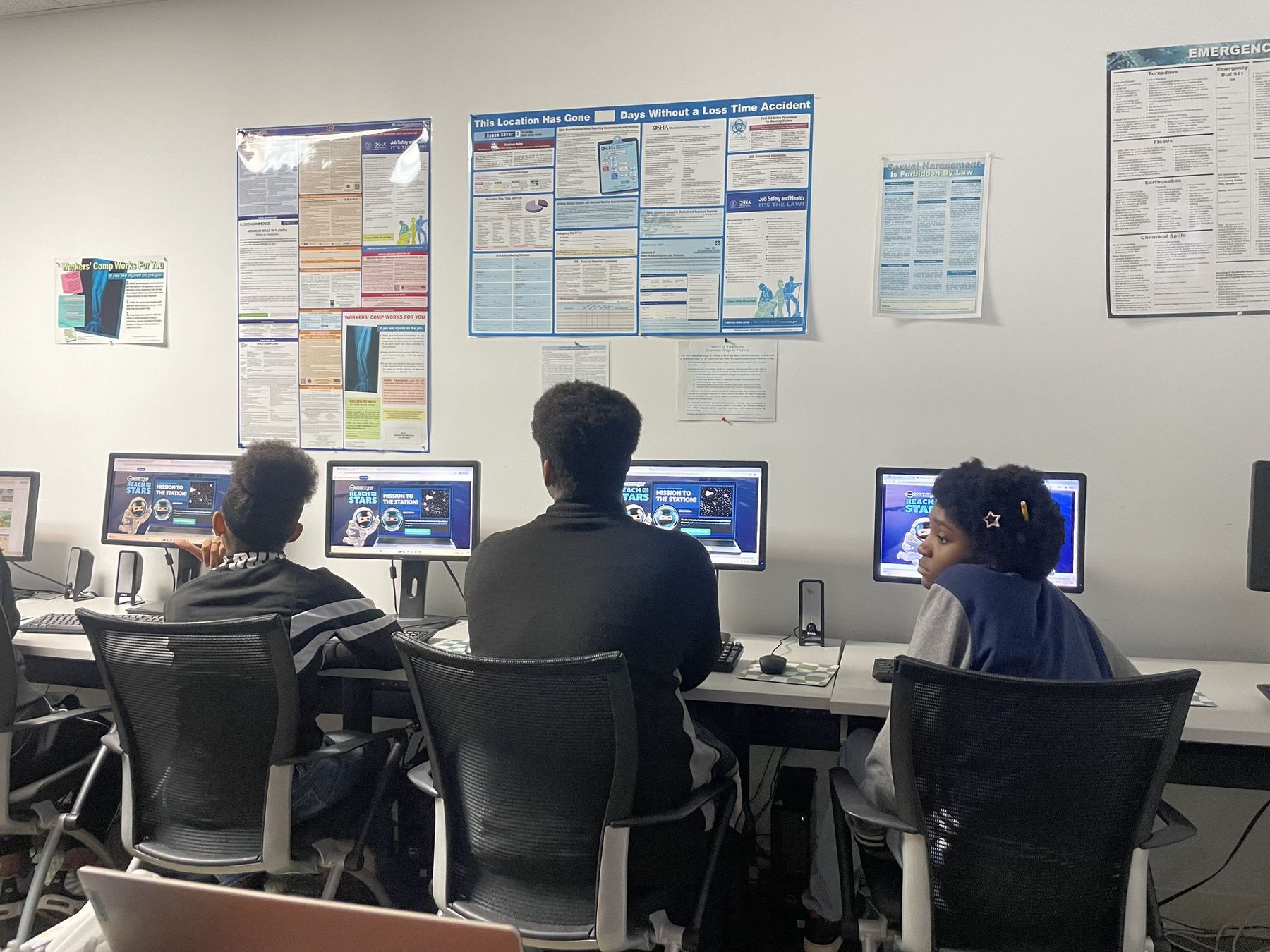 Students at work in the computer lab upstairs at the Weaver Center