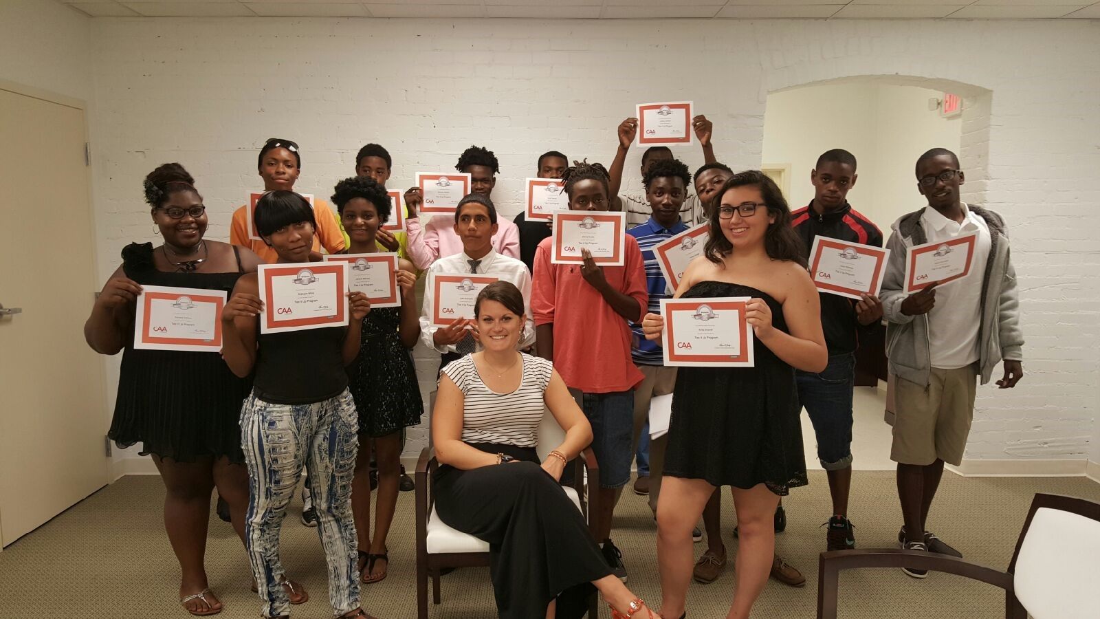 FreshPath students holding the certificates they earned
