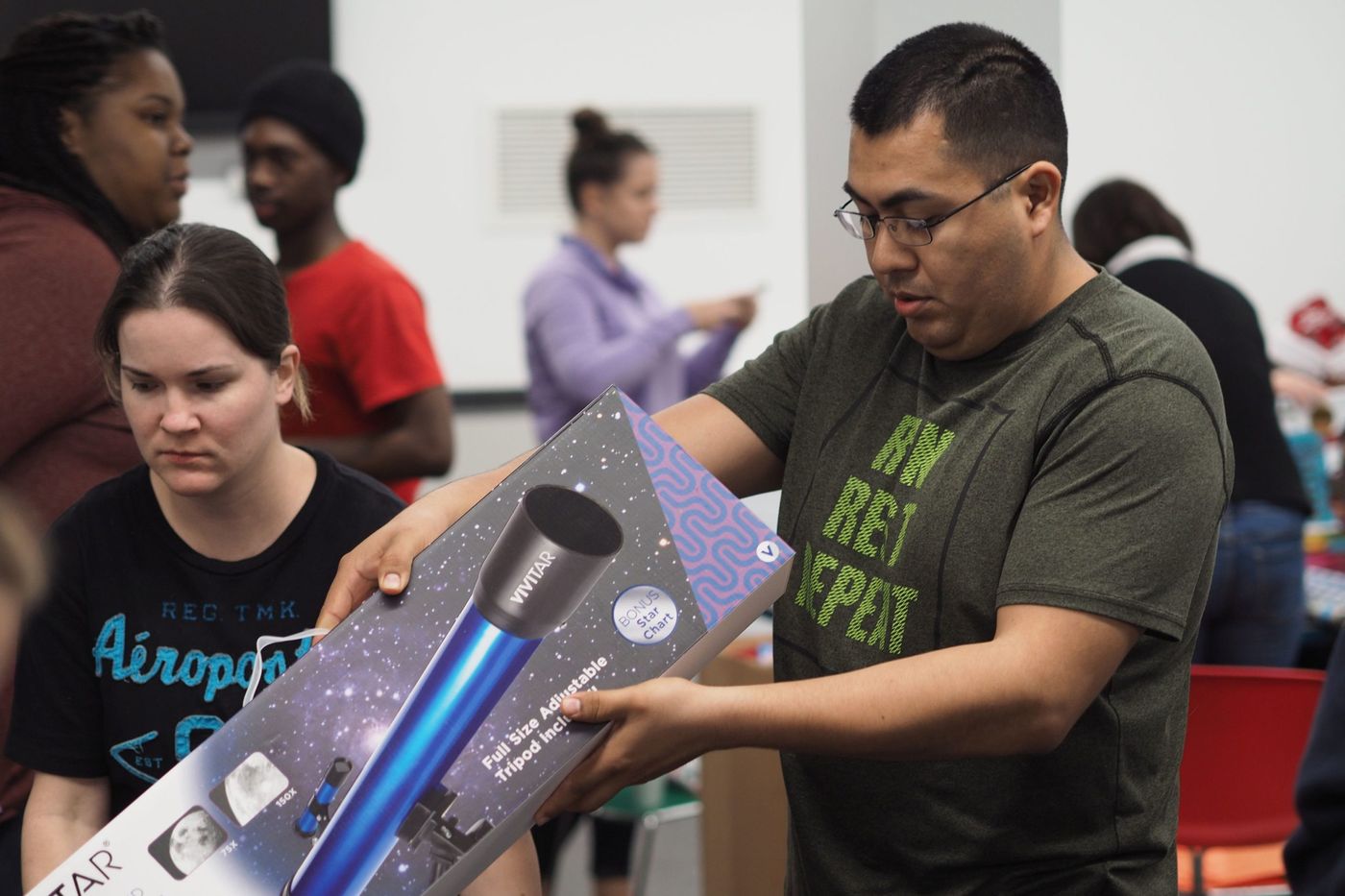 Volunteers handing out donated goods at a FreshMinistries drive.