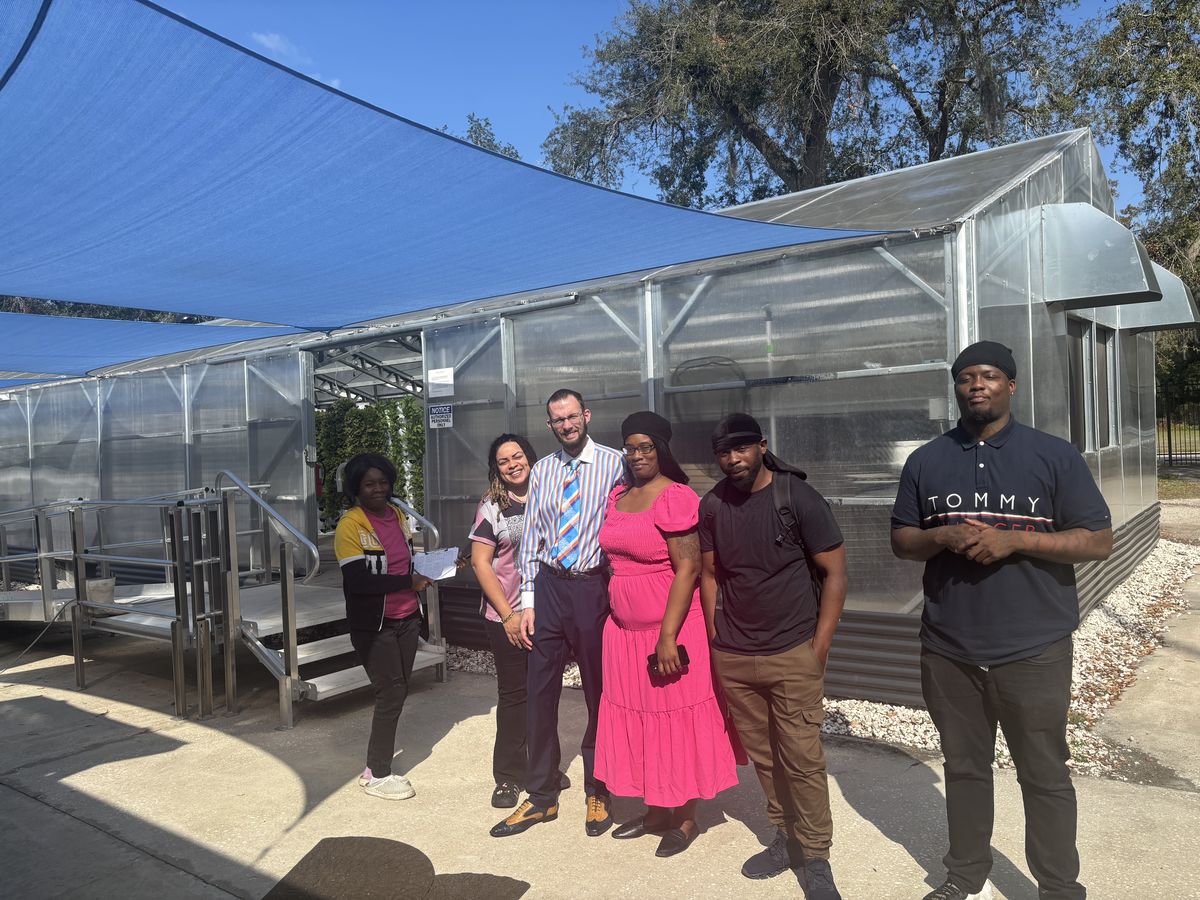 The NativeFresh greenhouse behind the Weaver Center
