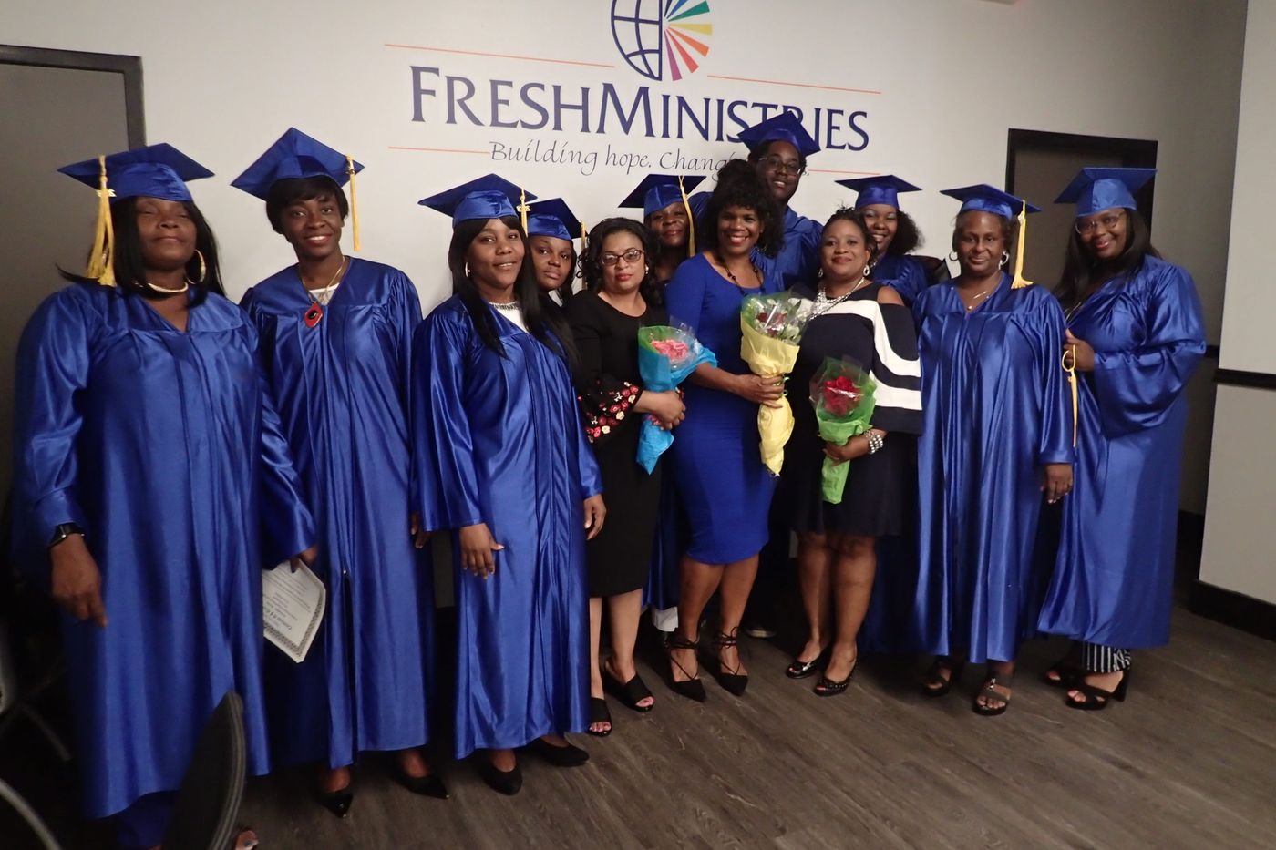 FreshMinistries staff and graduates together after a LifePoint graduation.