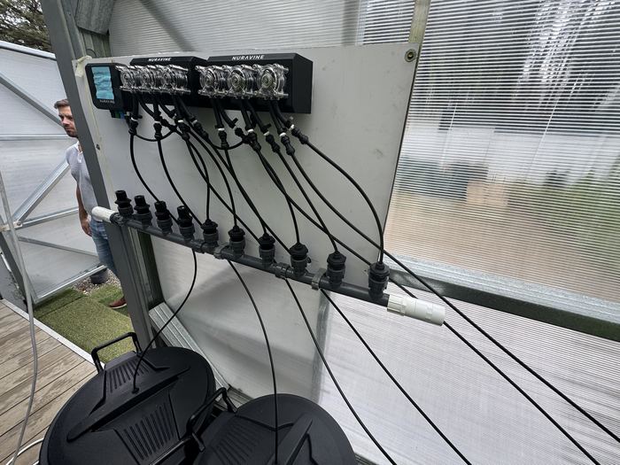 Water-quality sensor controllers wired to a manifold on the greenhouse wall at the Randburg training facility, Johannesburg